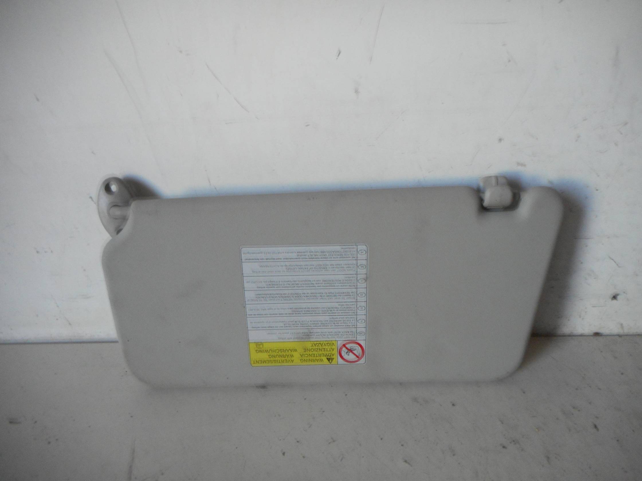 Aletta parasole parabrezza dx.